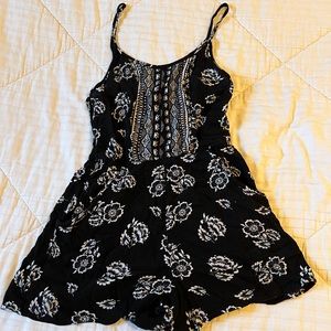 Lily Rose Black and white floral romper, with pockets!